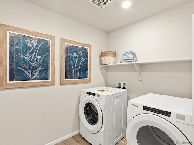 20802 E 66th Ave, Aurora, CO 80019 - laundry room featuring separate washer and dryer, light wood finished floors, baseboards, and recessed lighting
