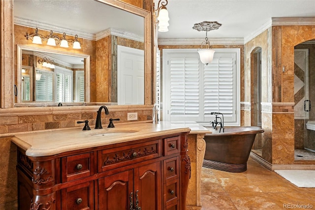 7809 S Coolidge Way, Aurora, CO 80016 - full bath with vanity, a soaking tub, a shower stall, and ornamental molding