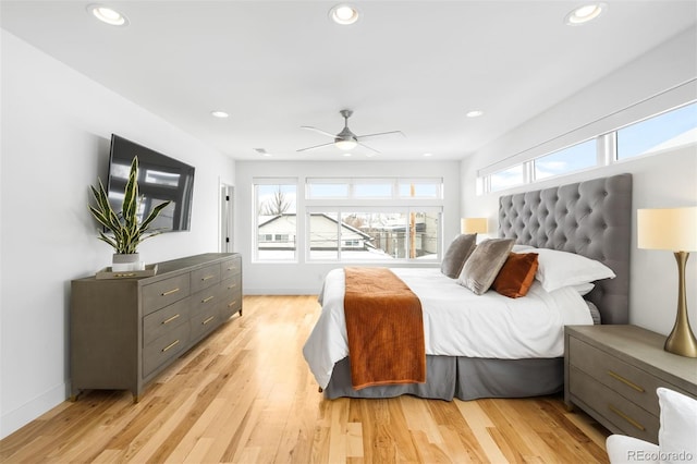 bedroom with a ceiling fan, recessed lighting, baseboards, and light wood finished floors