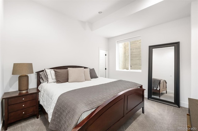 bedroom with light carpet, access to outside, and baseboards