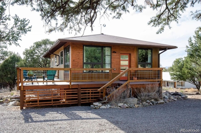 view of front of house with a deck