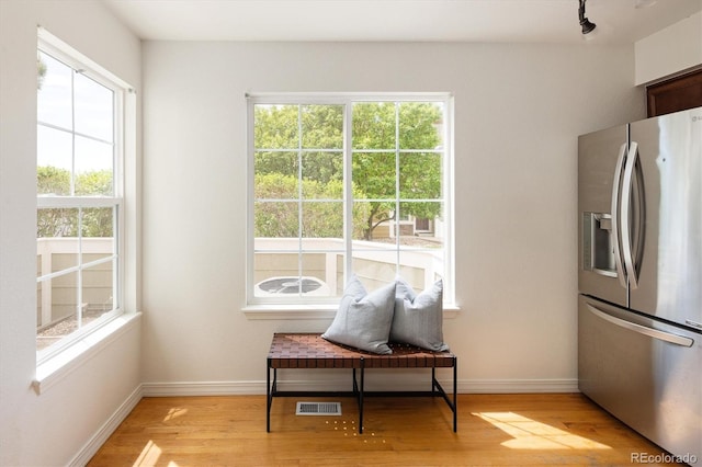 805 Summer Hawk Dr Unit 100, Longmont, CO 80504 - sitting room featuring light wood finished floors and baseboards