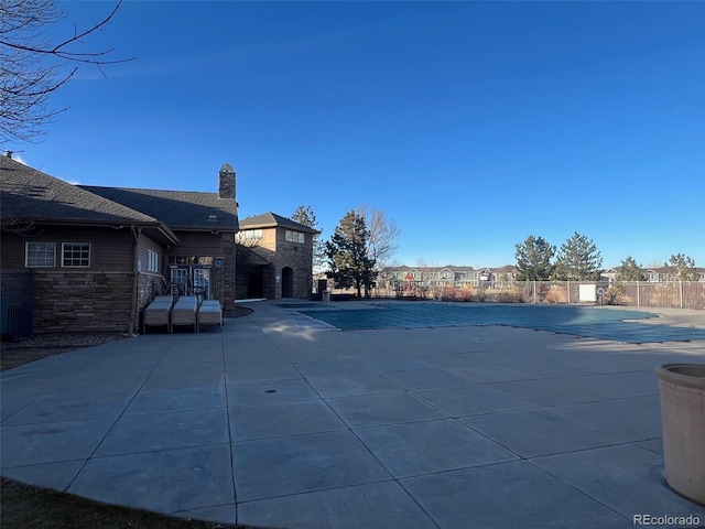 view of pool featuring a patio area