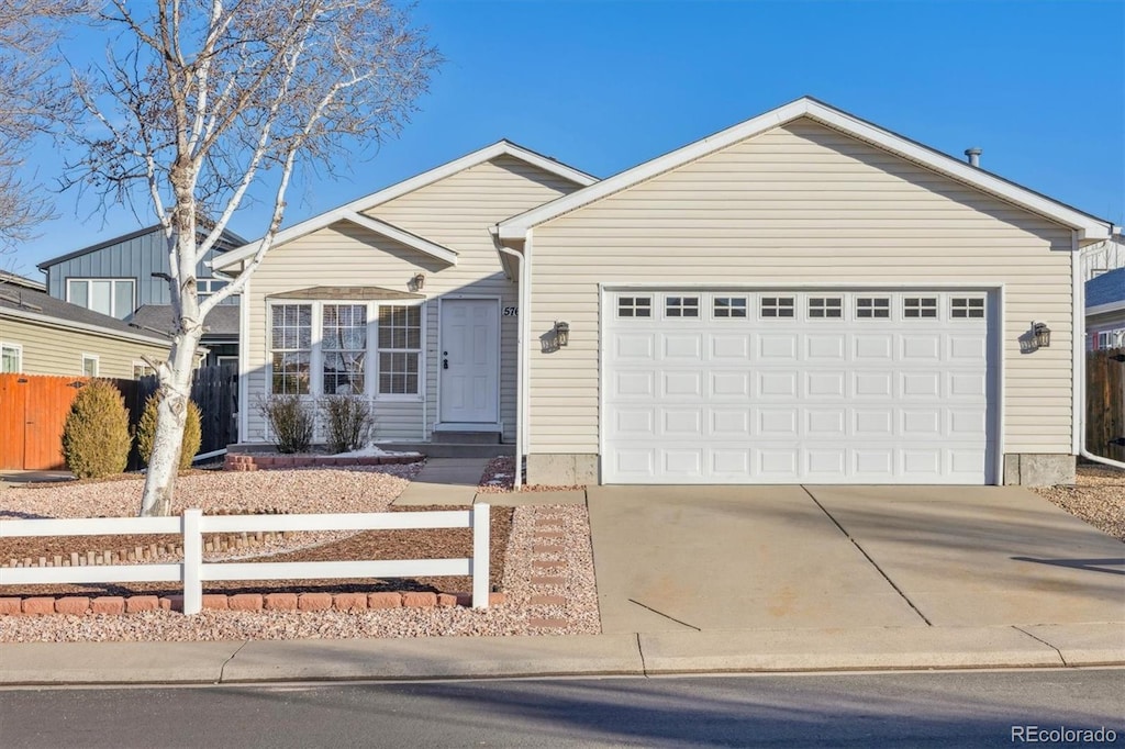 ranch-style home with a garage