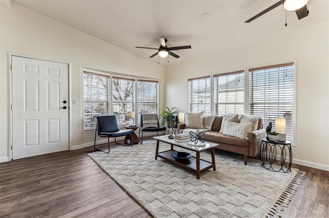 living room featuring ceiling fan, hardwood / wood-style floors, and lofted ceiling