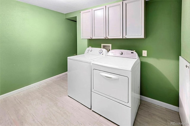 1209 S Flower Cir Unit C, Lakewood, CO 80232 - laundry room with cabinet space, independent washer and dryer, and baseboards