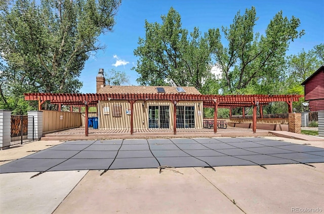 1209 S Flower Cir Unit C, Lakewood, CO 80232 - view of pool with a pergola and a patio