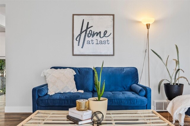 5054 W 61st Dr, Arvada, CO 80003 - living area featuring wood finished floors and baseboards