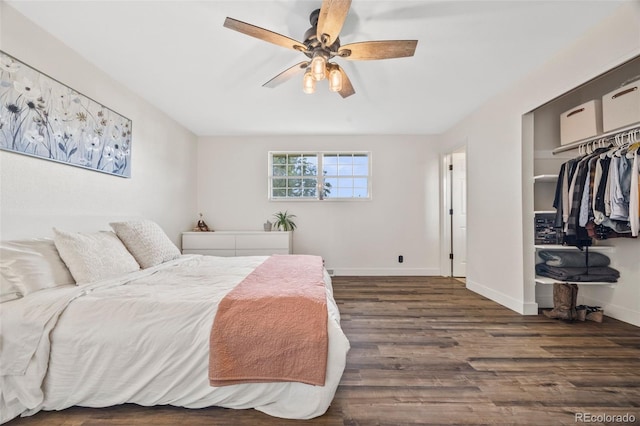 5054 W 61st Dr, Arvada, CO 80003 - bedroom featuring wood finished floors, a closet, and ceiling fan