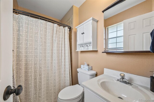 5054 W 61st Dr, Arvada, CO 80003 - full bath with vanity and a shower with shower curtain