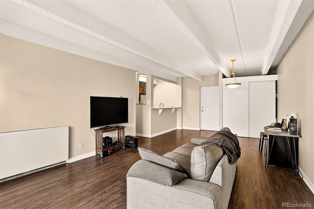 1365 Columbine St Unit 403, Denver, CO 80206 - living area with wood finished floors and a textured ceiling