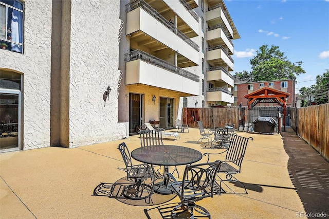 1365 Columbine St Unit 403, Denver, CO 80206 - view of patio with a grill