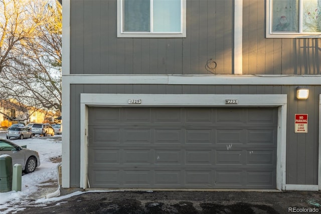 view of snow covered garage