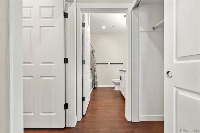 hall featuring dark wood-type flooring