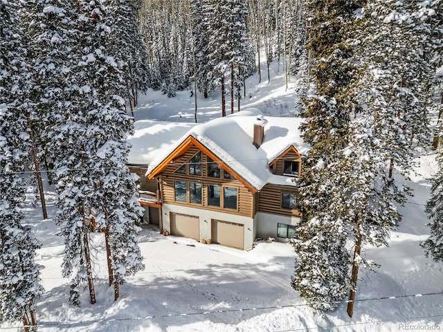 log cabin with a garage