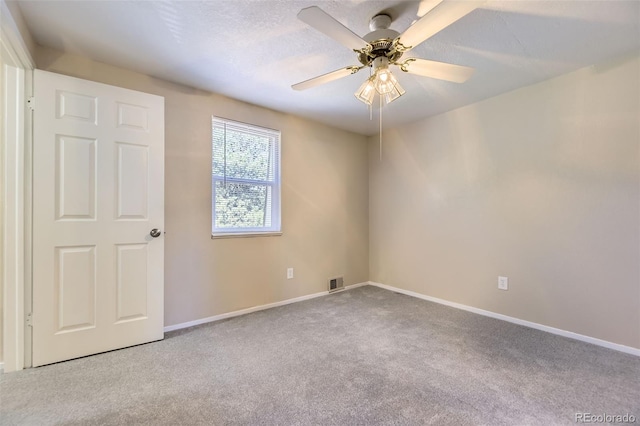 5828 S Pearl St, Centennial, CO 80121 - carpeted empty room featuring baseboards and a ceiling fan