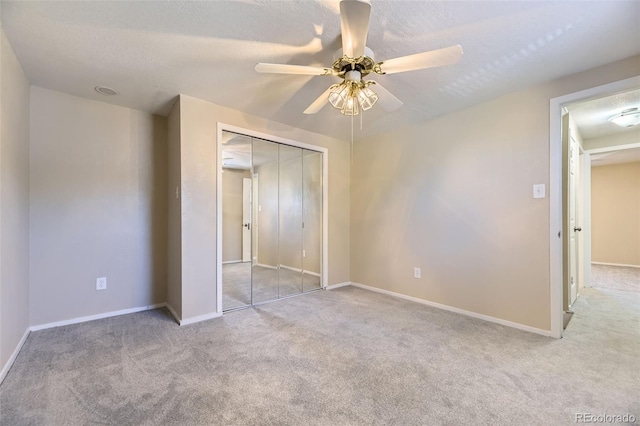 5828 S Pearl St, Centennial, CO 80121 - unfurnished bedroom featuring carpet, a closet, a ceiling fan, and a textured ceiling