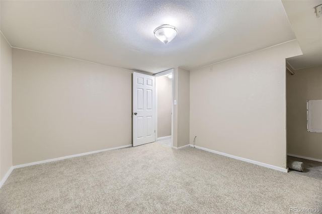 5828 S Pearl St, Centennial, CO 80121 - finished below grade area featuring a textured ceiling and carpet floors