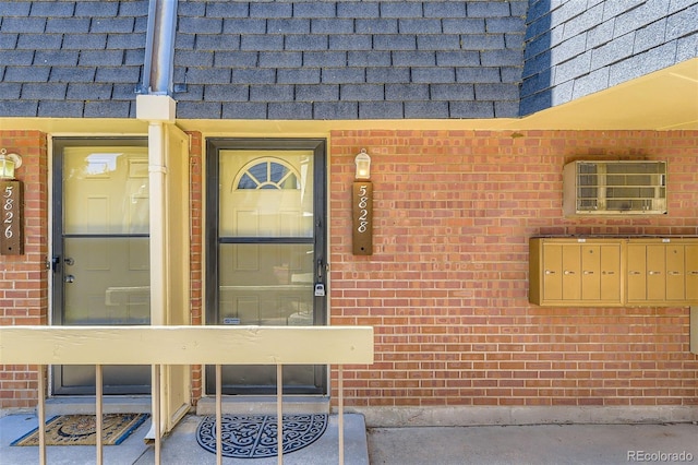 5828 S Pearl St, Centennial, CO 80121 - doorway to property with brick siding