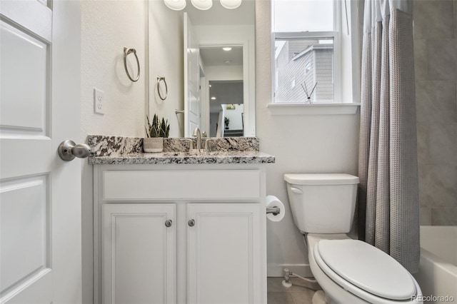 full bathroom featuring vanity, toilet, and shower / bath combo with shower curtain