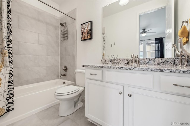 full bathroom featuring shower / bath combo with shower curtain, toilet, tile patterned flooring, ceiling fan, and vanity