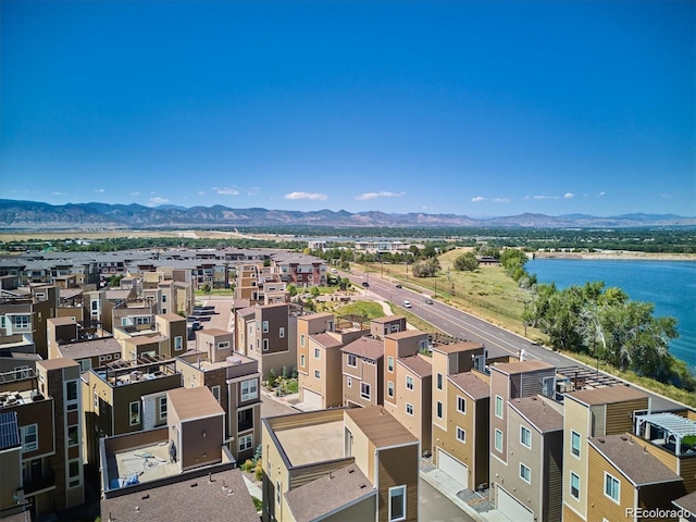 aerial view with a residential view and a water and mountain view