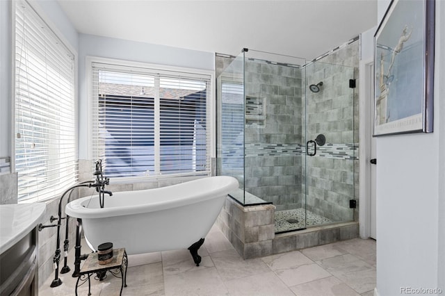 10519 Winterflower Way, Parker, CO 80134 - full bathroom featuring a stall shower and a soaking tub