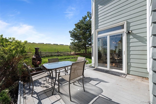 10519 Winterflower Way, Parker, CO 80134 - wooden terrace featuring fence and outdoor dining area
