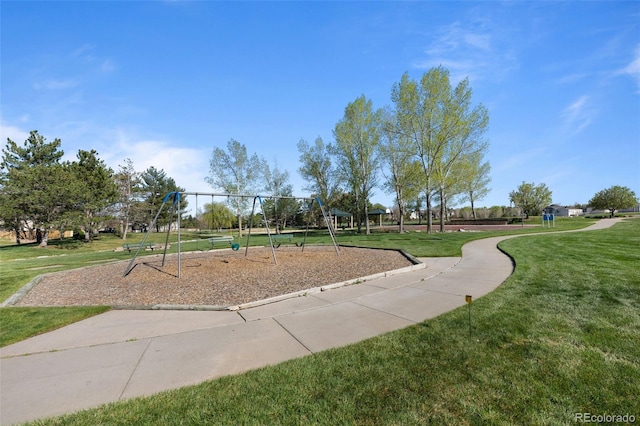 10519 Winterflower Way, Parker, CO 80134 - view of community with a yard and playground community