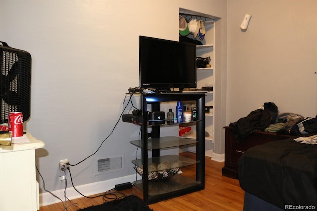 bedroom featuring hardwood / wood-style floors