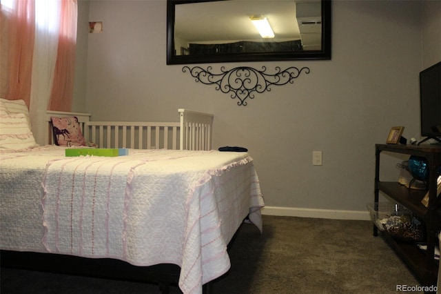 bedroom featuring dark colored carpet