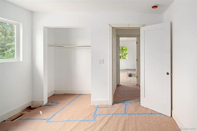 7313 S Boulder Rd, Boulder, CO 80303 - unfurnished bedroom featuring a closet and baseboards