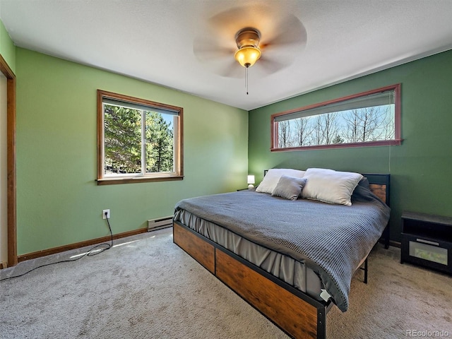 10852 Conifer Mountain Rd, Conifer, CO 80433 - bedroom featuring carpet floors, baseboard heating, and baseboards