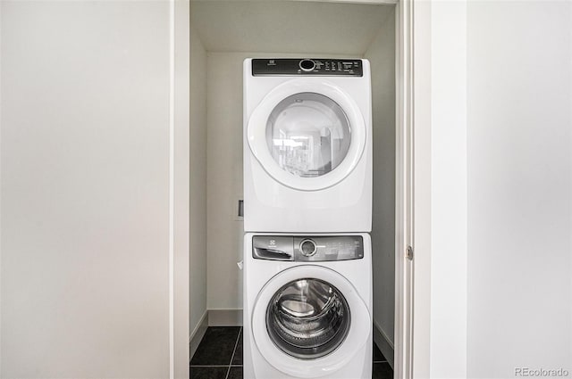 822 Fairfax St, Denver, CO 80220 - laundry room featuring stacked washer / dryer and tile patterned flooring