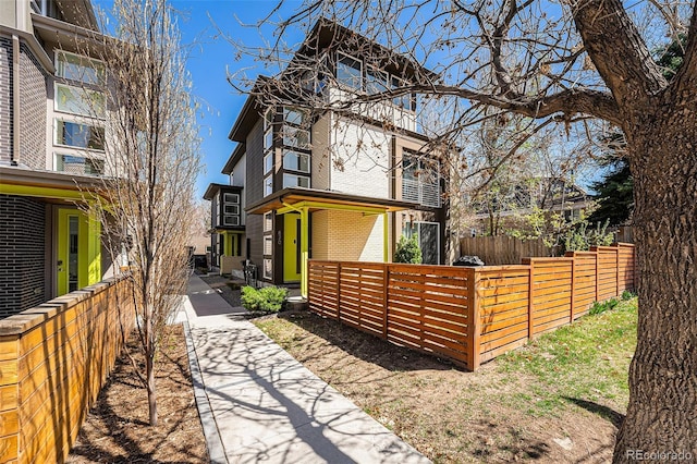 822 Fairfax St, Denver, CO 80220 - view of side of home with brick siding