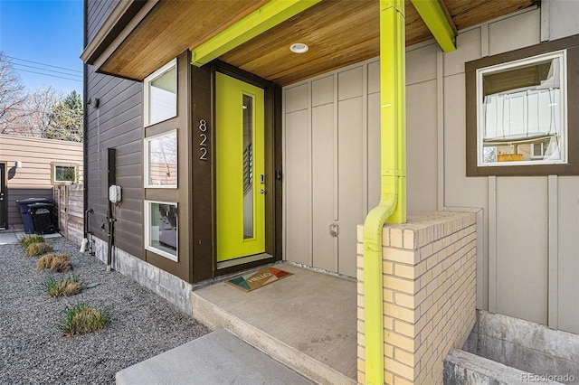 822 Fairfax St, Denver, CO 80220 - property entrance featuring board and batten siding