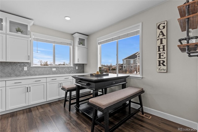 dining room featuring dark wood-type flooring