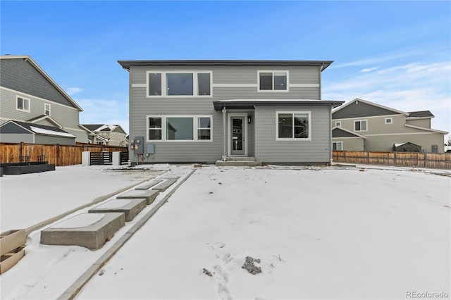 view of snow covered property