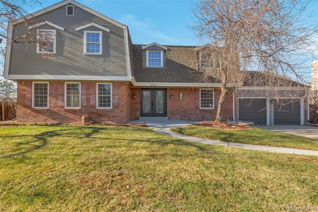 view of front of house with a garage, a front yard, and french doors