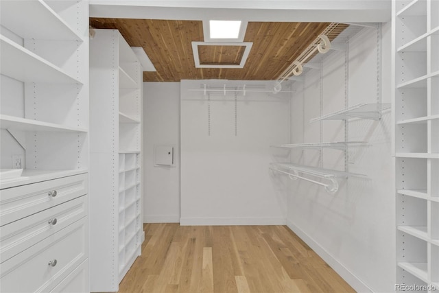 spacious closet with light hardwood / wood-style floors