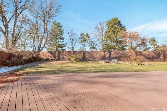 deck featuring a lawn