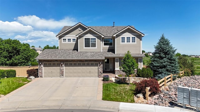 10533 Redcone Way, Highlands Ranch, CO 80130 - craftsman-style house featuring driveway, a garage, and roof with shingles