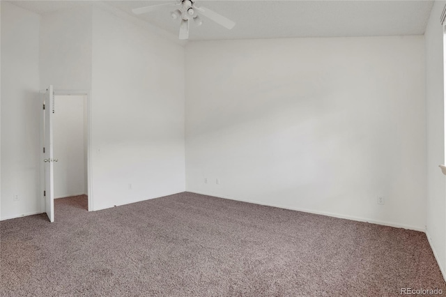 empty room featuring carpet and ceiling fan