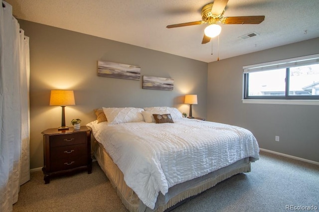 10652 W Florida Ave Unit D, Lakewood, CO 80232 - carpeted bedroom featuring baseboards and ceiling fan