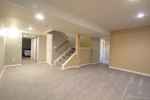 10652 W Florida Ave Unit D, Lakewood, CO 80232 - finished below grade area featuring carpet, stairway, and recessed lighting