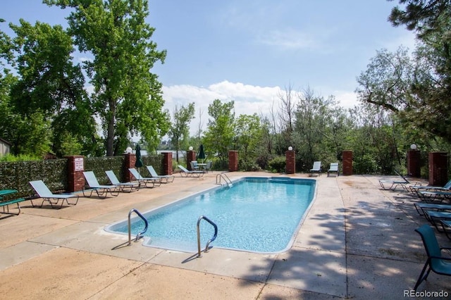 10652 W Florida Ave Unit D, Lakewood, CO 80232 - community pool with a patio