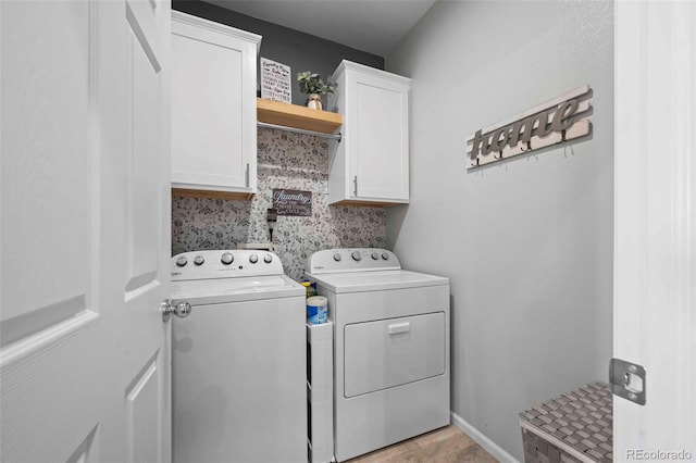 119 Jackson Dr, Erie, CO 80516 - clothes washing area featuring cabinet space and separate washer and dryer