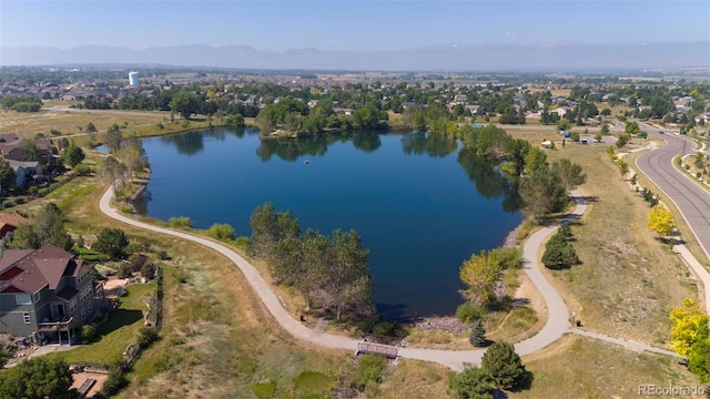 119 Jackson Dr, Erie, CO 80516 - drone / aerial view with a water and mountain view