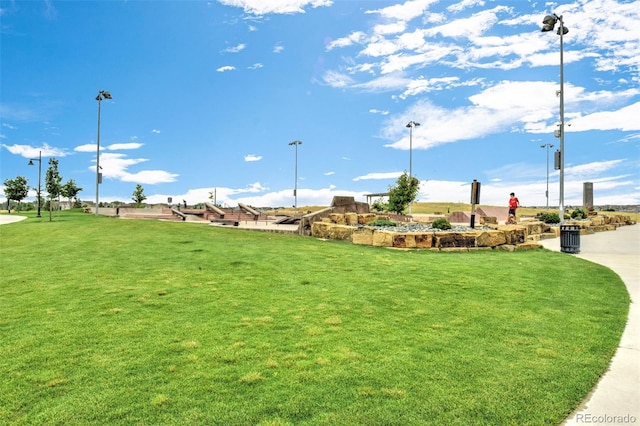 119 Jackson Dr, Erie, CO 80516 - surrounding community with a lawn
