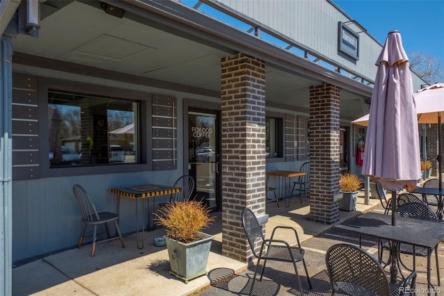 119 Jackson Dr, Erie, CO 80516 - view of patio featuring outdoor dry bar
